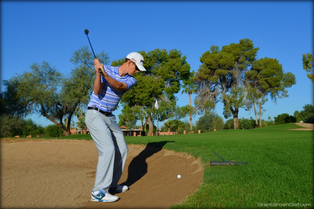 sand ball above top of backswing